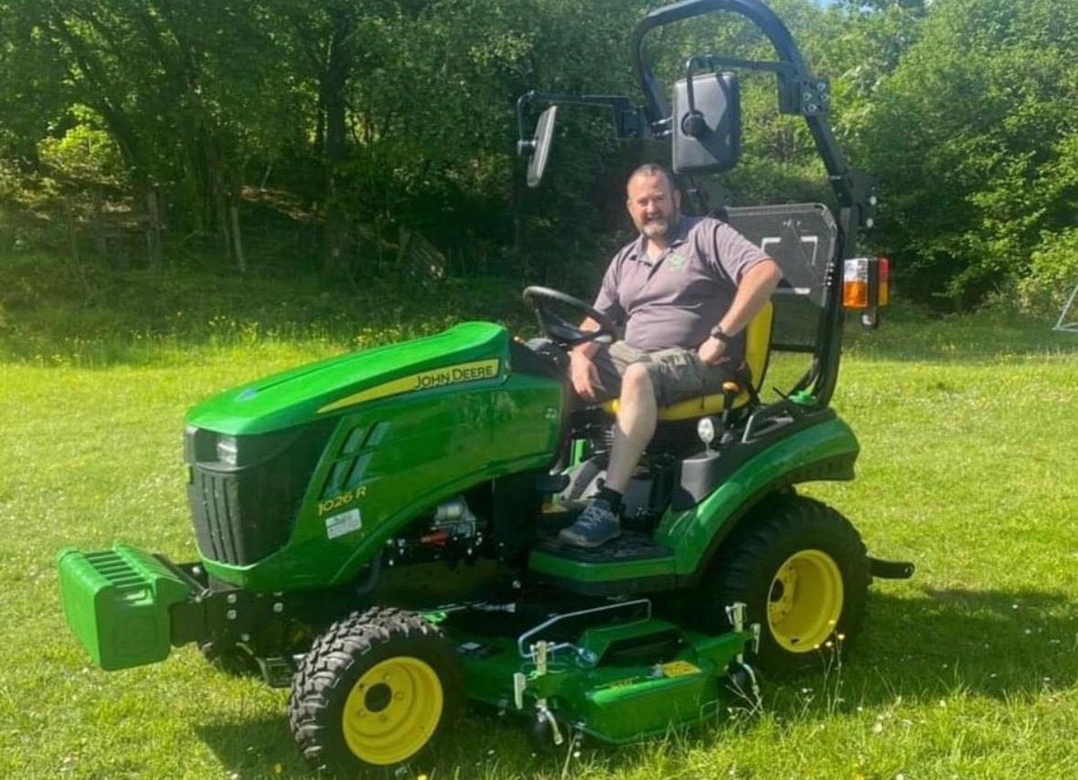 Tractor mowing large grounds